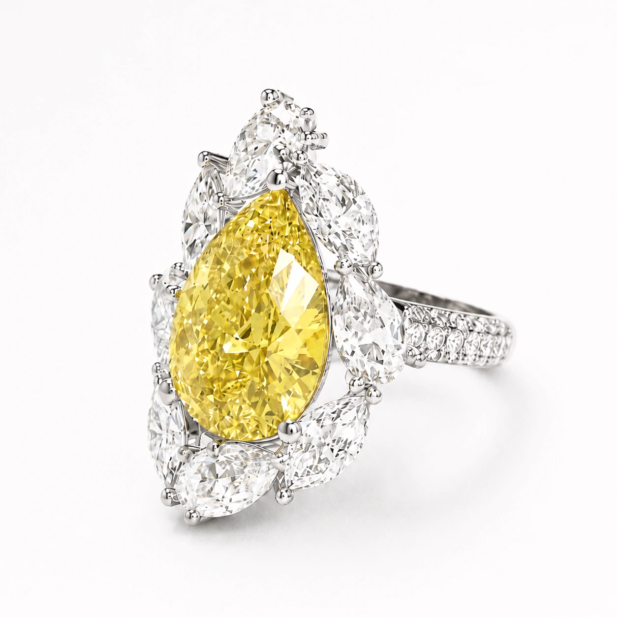 Yellow pear-cut gemstone ring with a marquise silhouette — setting detail