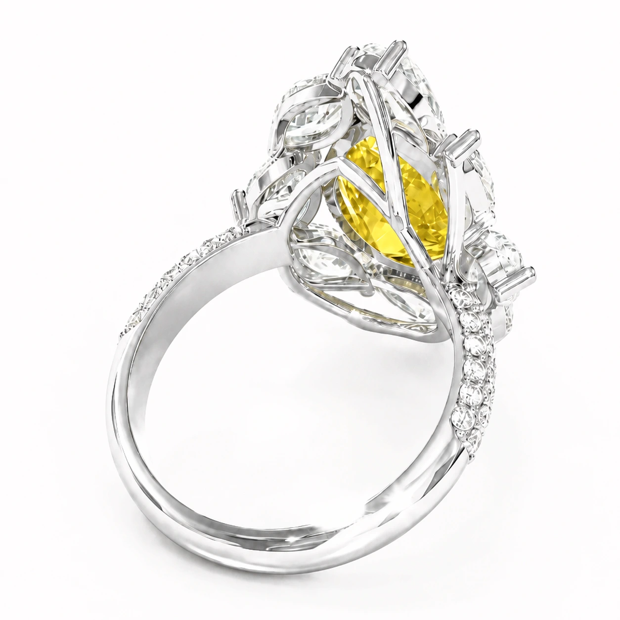 Yellow pear-cut gemstone ring with a marquise silhouette — side view